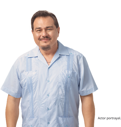 A medium skin toned, masculine-presenting person in their forties looking at the camera and smiling. Actor portrayal.