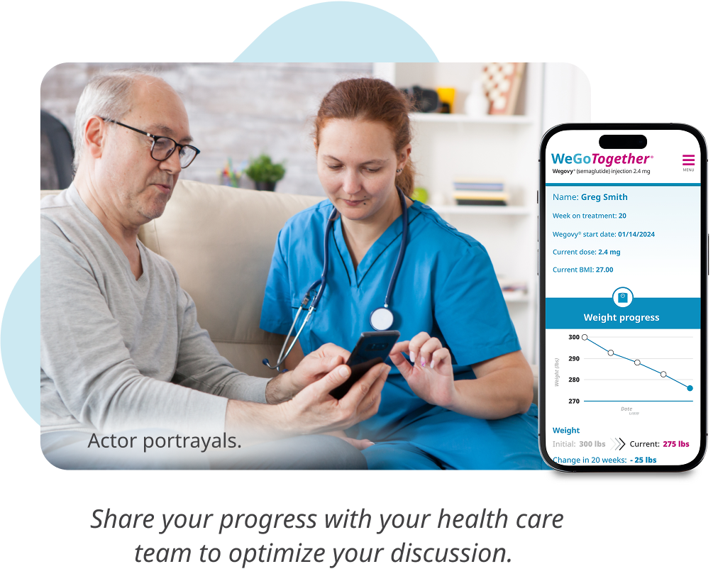 Two light skin toned people, a doctor and a patient, sit together looking at a smartphone. Actor portrayals.